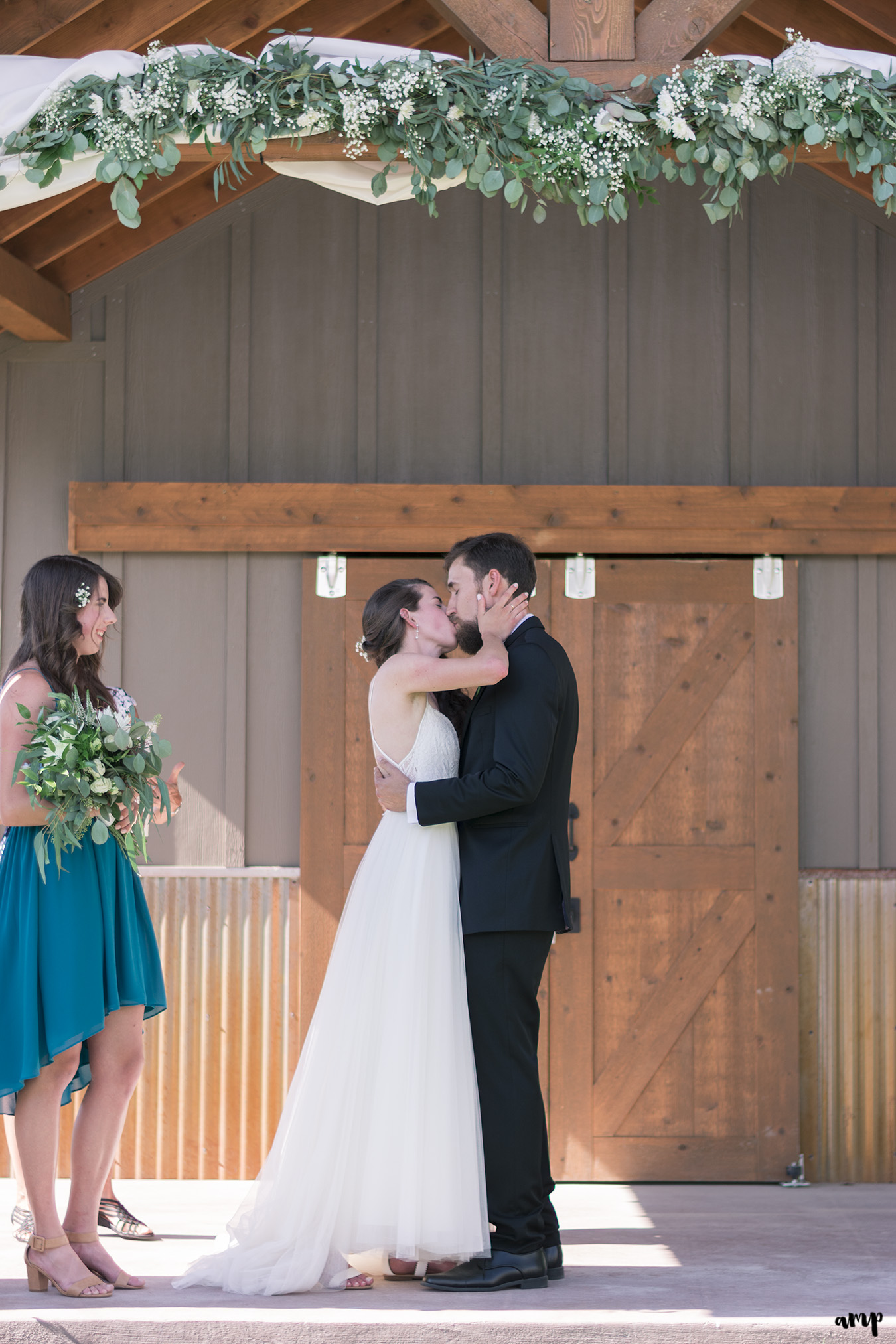 Bride and groom's first kiss at their Montrose Botanic Garden Elopement