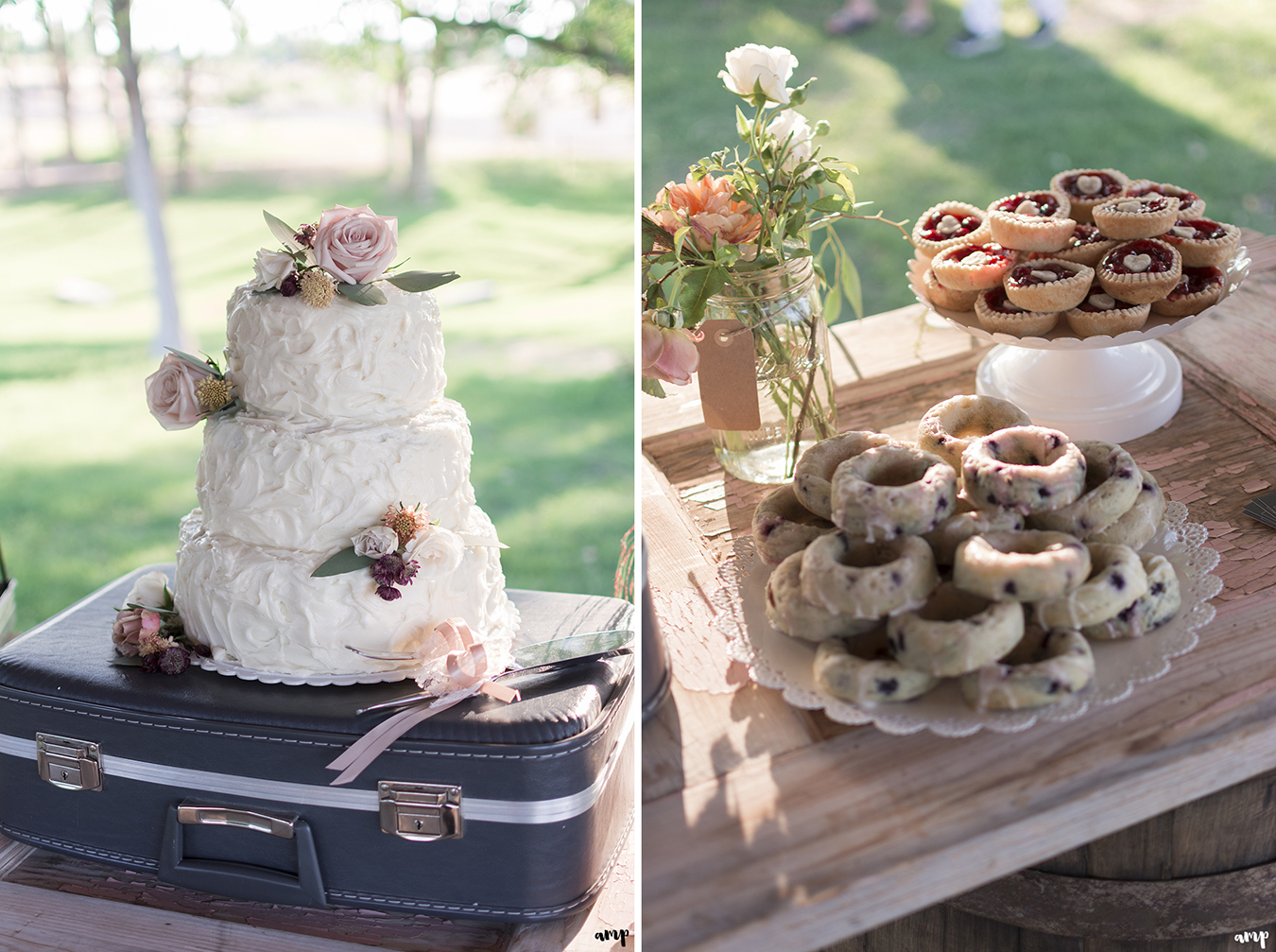 Frosted wedding cake and dessert table sitting on an antique suitcase